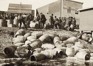 ATF confiscating illegal alcohol, in Elk Lake, Canada, in 1925.