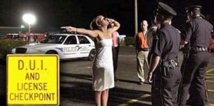 Woman submitting to field sobriety 